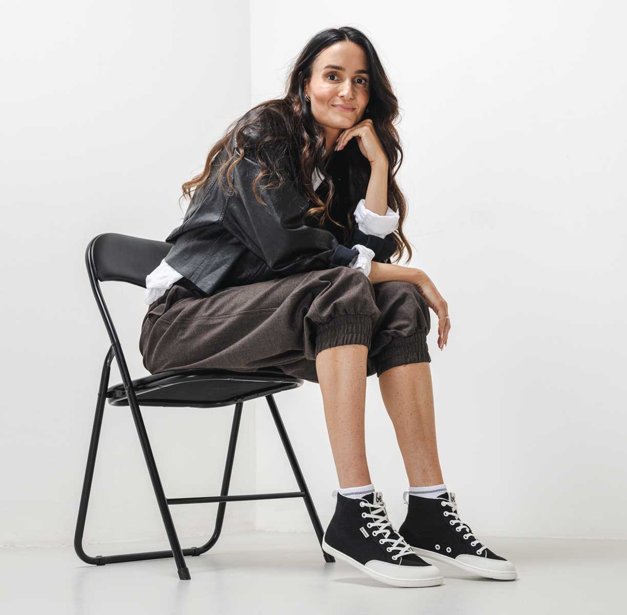 Be Lenka Rebound High Top - Black & White, high-top barefoot sneakers, lifestyle shot with model