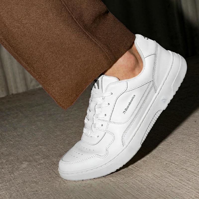 White Zing barefoot shoes during natural foot movement White Zing barefoot shoes during natural foot movement