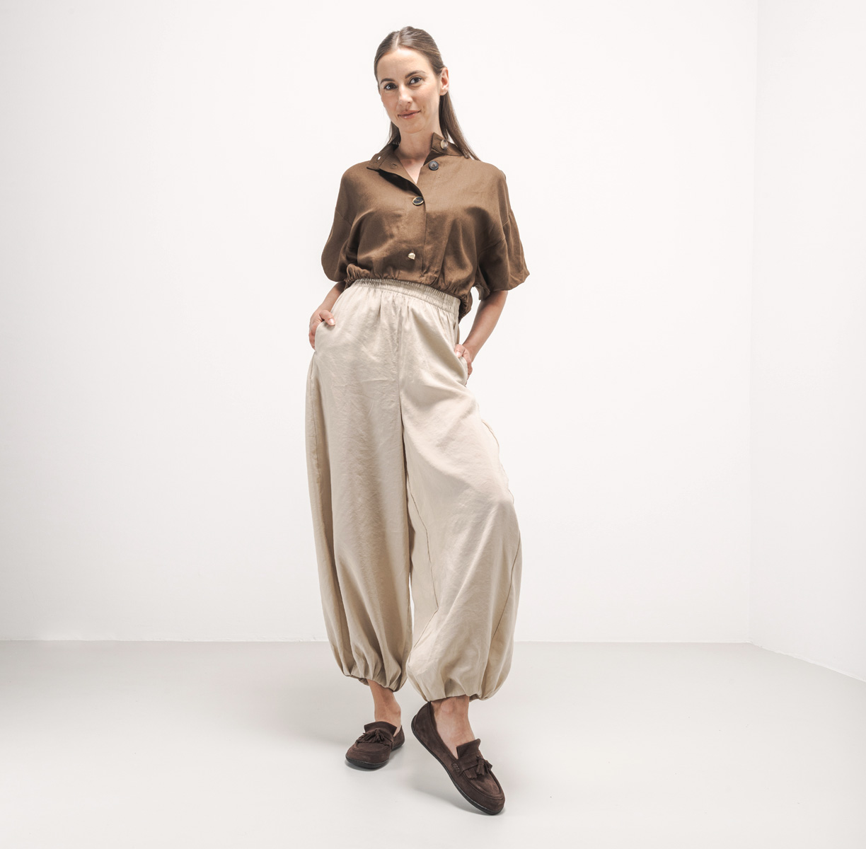 Be Lenka Fiorela - chocolate, barefoot moccasins, lifestyle shot