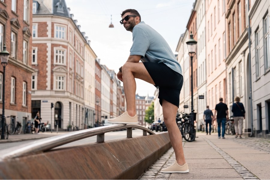 Man in cream men's spring barefoot shoes on a city street Man in cream men's spring barefoot shoes on a city street